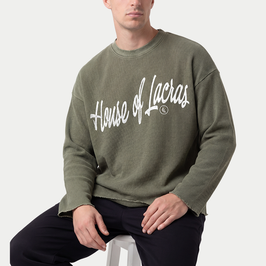 Model wearing House of lacras front view long sleeve waffle tee with raw edges by caracas merch streetwear