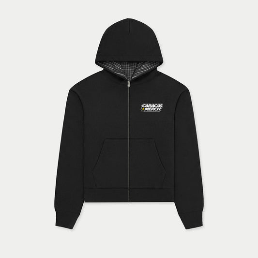 Black zip-up hoodie with plaid hood lining and Caracas Merch logo