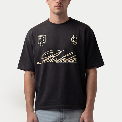 Model wearing black Boleta oversized graphic t-shirt with cream print