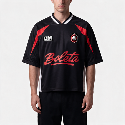 Modelo usado Camiseta de fútbol negro «Boleta Brasil» de Caracas Merch, vista frontal plana