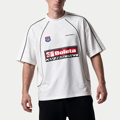 Male model wearing the white Boleta Racing jersey by Caracas Merch, front view