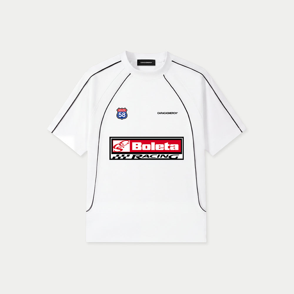 White Boleta Racing jersey by Caracas Merch with “Boleta Racing” patch graphic at front, front view