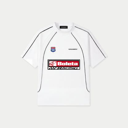 White Boleta Racing jersey by Caracas Merch with “Boleta Racing” patch graphic at front, front view