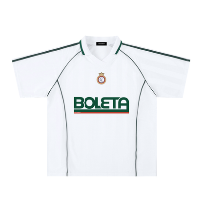 White soccer-style jersey front view with striped texture, V-neck collar, and bold “BOLETA” graphic across the chest – Caracas Merch