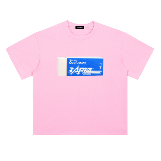 pink oversized t-shirt front view with eraser graphic and “Bórralo que fue con lápiz” text in blue label style – Caracas Merch