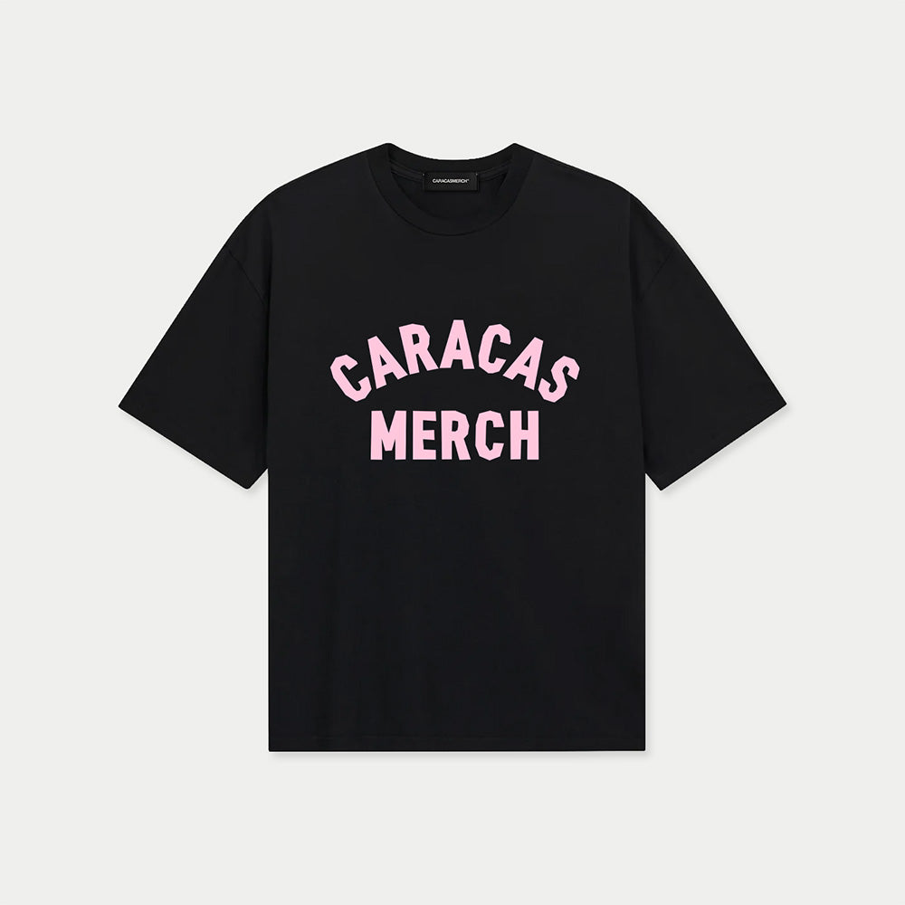 Black oversized Caracas Merch t-shirt with arched pink logo at front, front view