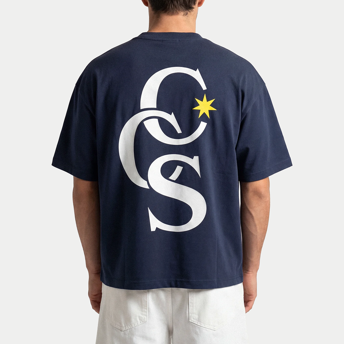Back view of navy CCS classic graphic t-shirt by Caracas Merch