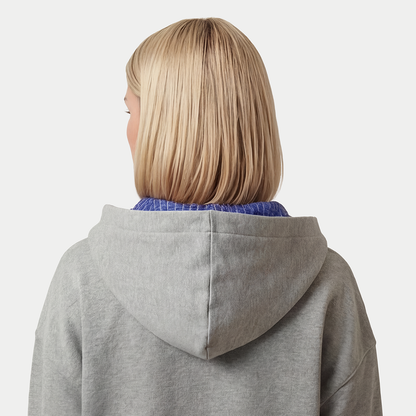 Back view of women’s gray hoodie featuring blue hood lining by Caracas Merch