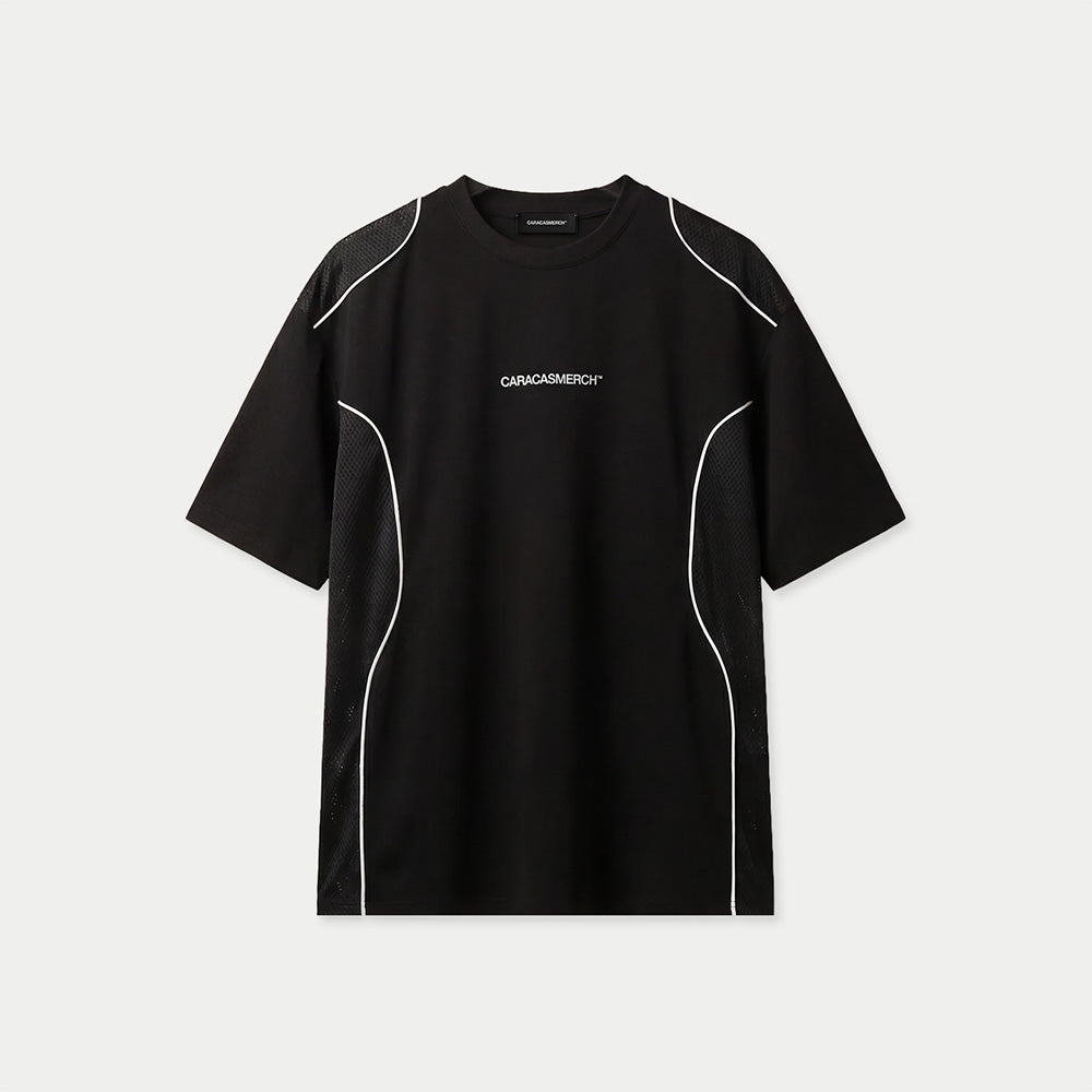Front view of black Caracas Merch performance t-shirt with white piping