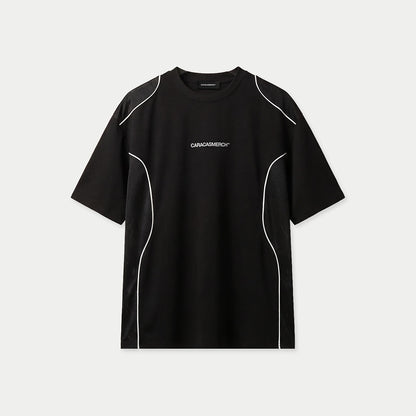 Front view of black Caracas Merch performance t-shirt with white piping