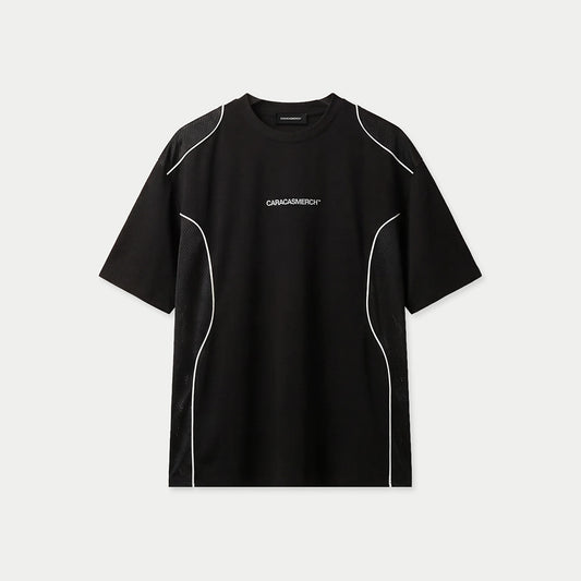 Front view of black Caracas Merch performance t-shirt with white piping