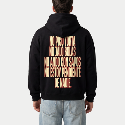Model wearing black hoodie with “No pico torta no jalo bolas” print on back