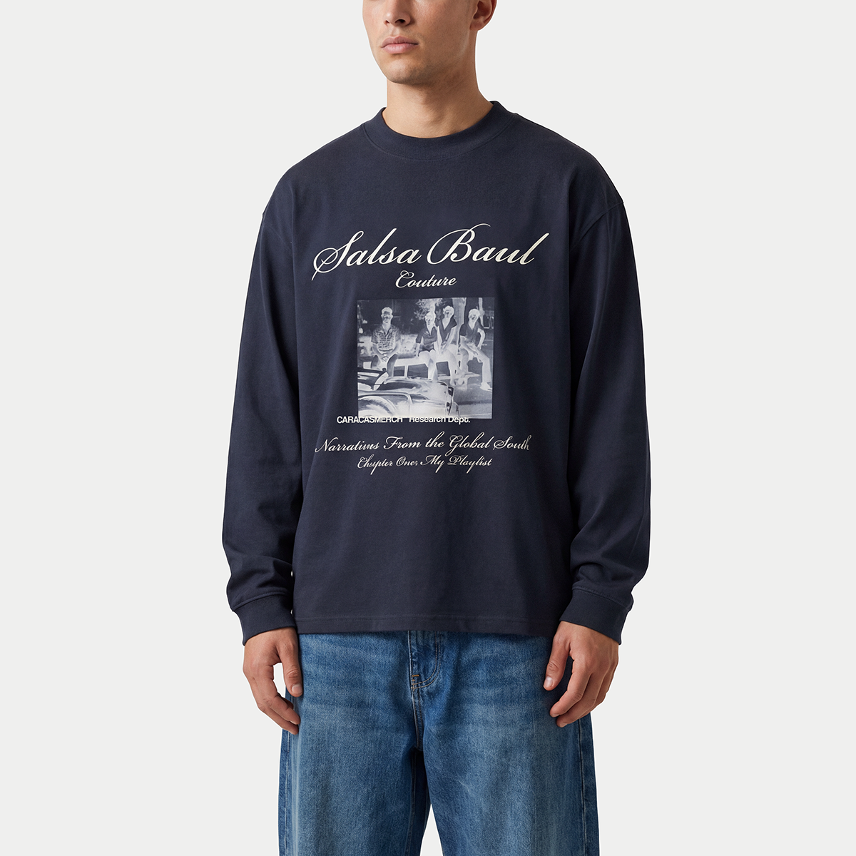 Male model wearing navy Salsa Baúl long sleeve shirt by Caracas Merch