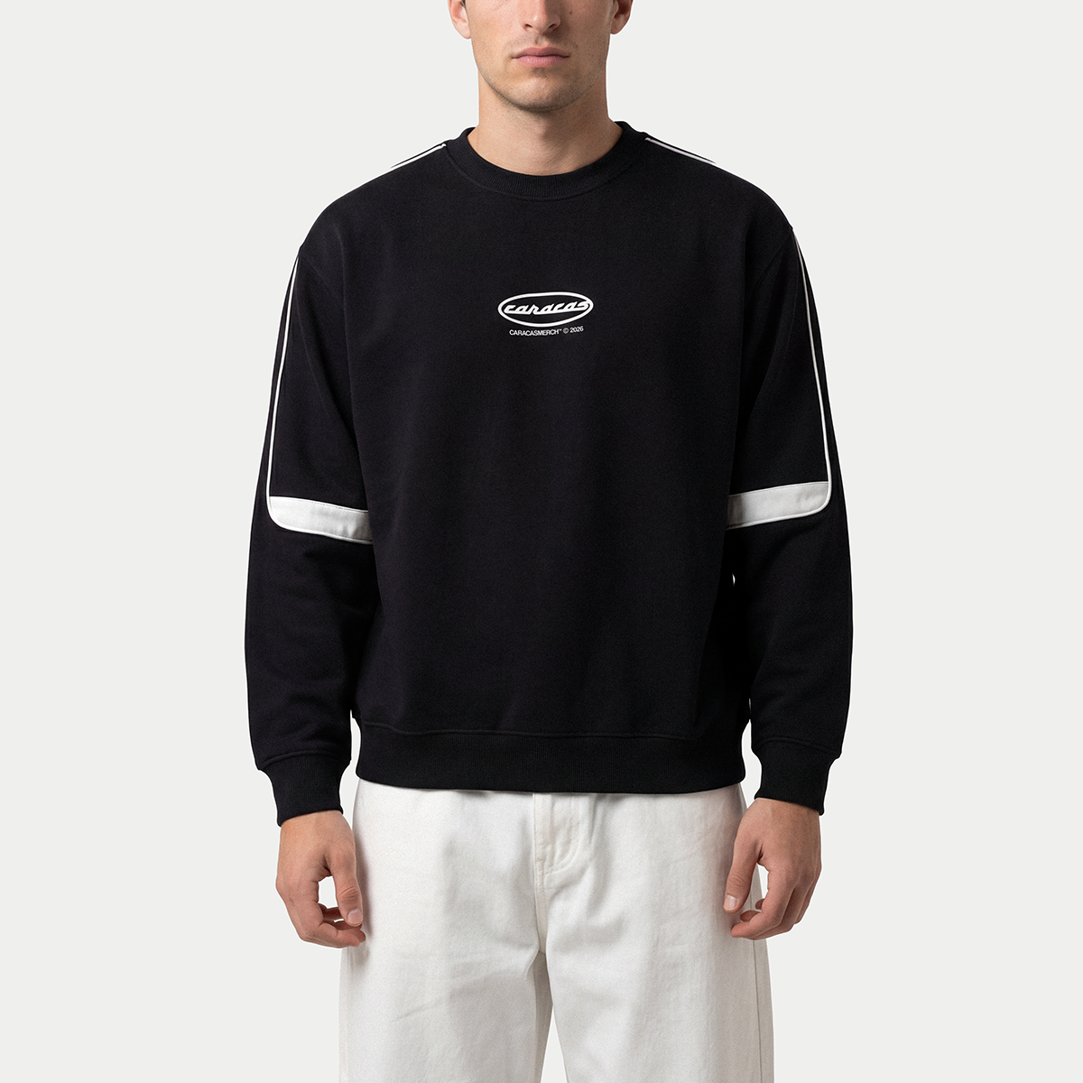 Black oversized crewneck sweatshirt worn by male model