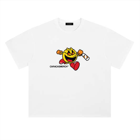 White oversized t-shirt front view with cartoon running character graphic holding a bottle and Caracas Merch logo underneath
