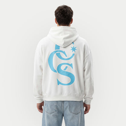 model wearing CCS Monogram Hoodie white with blue back print Caracas Merch streetwear hoodie