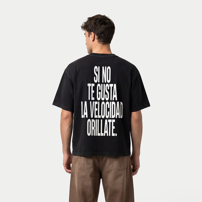 close up of model wearing si no te gusta la velocidad orillate black tee
