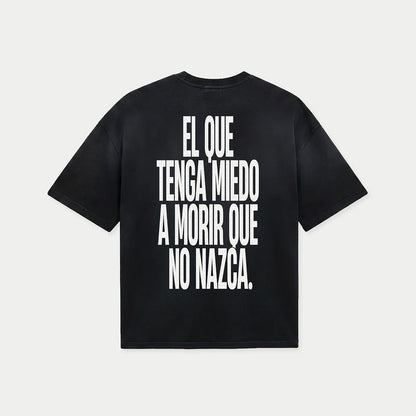 Black oversized t-shirt with El que tenga miedo a morir que no nazca Spanish statement print