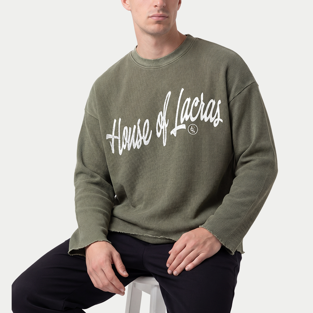Model wearing House of lacras front view long sleeve waffle tee with raw edges by caracas merch streetwear