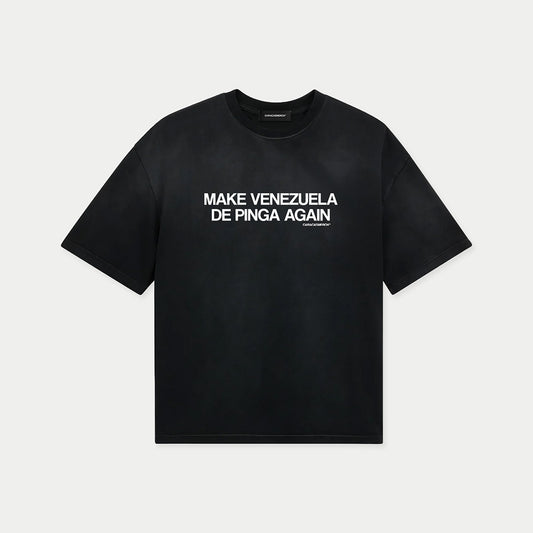 Black t-shirt with white “Make Venezuela De Pinga Again” print by Caracas Merch