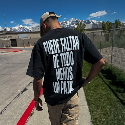 male model wearing puede faltar de todo menos un pajuo black tee lifestyle shot