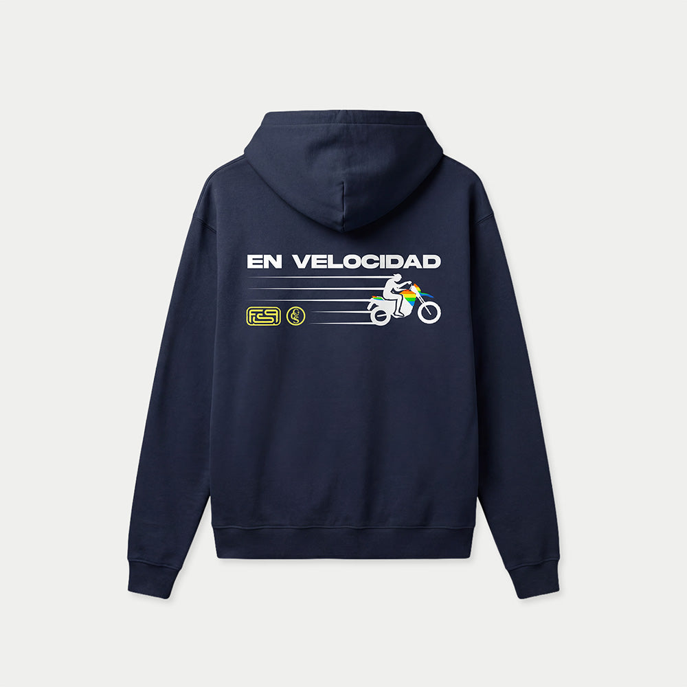 Metro Caracas navy hoodie back design with “En Velocidad” racing graphic