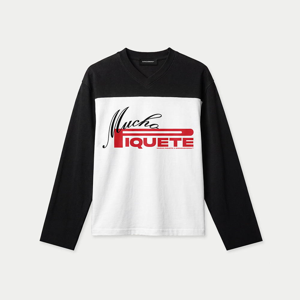 Front view of black and white Mucho piquete long sleeve shirt by Caracas Merch