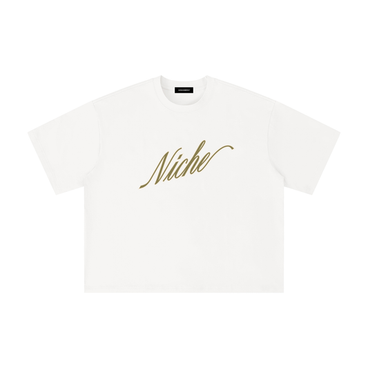 White oversized boxy t-shirt front view with elegant “Niche” script logo in gold centered on the chest – Caracas Merch