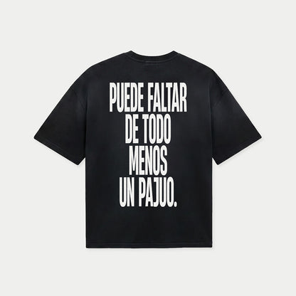Back view of puede faltar de todo menos un pajuo black graphic t-shirt