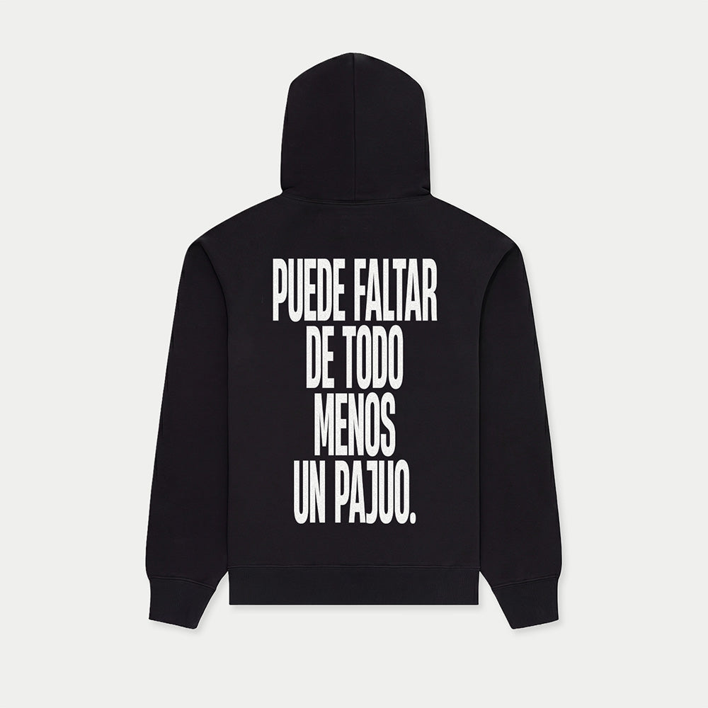 Black hoodie with “Puede faltar de todo menos un pajuo” graphic on back by Caracas Merch