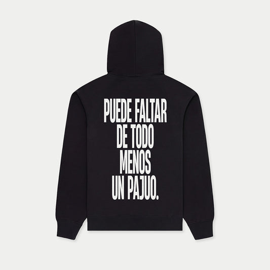Black hoodie with “Puede faltar de todo menos un pajuo” graphic on back by Caracas Merch
