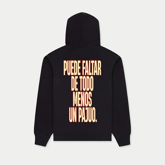 Back view of black hoodie with “Puede faltar de todo menos un Pajuo” print