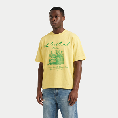 Model wearing yellow Salsa Baul Couture graphic t-shirt