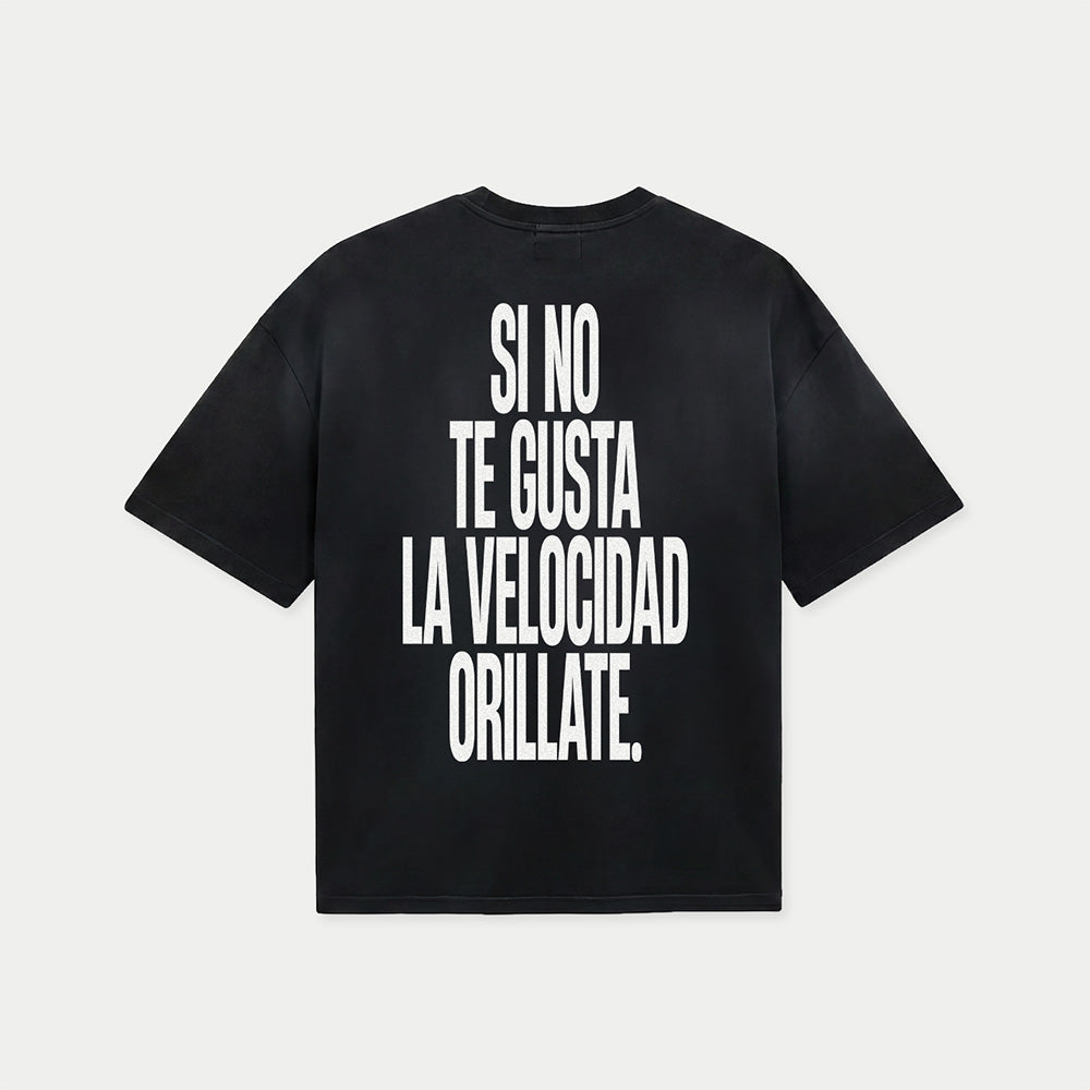 Back view of si no te gusta la velocidad orillate black graphic t-shirt