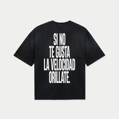 Back view of si no te gusta la velocidad orillate black graphic t-shirt