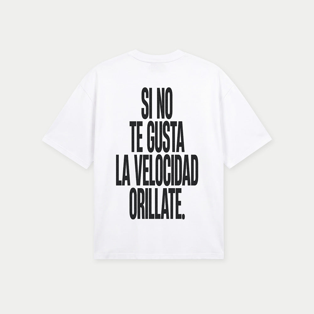 Back view of si no te gusta la velocidad orillate white graphic t-shirt