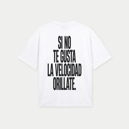 Back view of si no te gusta la velocidad orillate white graphic t-shirt