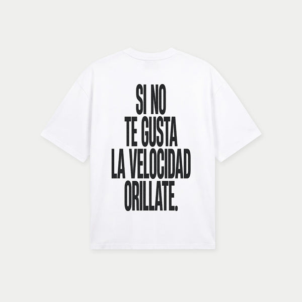 Back view of si no te gusta la velocidad orillate white graphic t-shirt