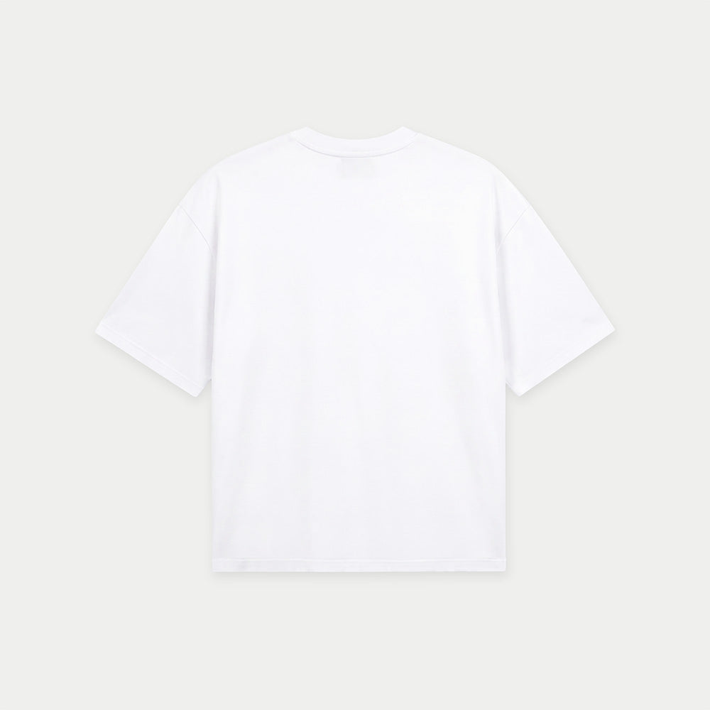 White oversized t-shirt back view with bold “Super Fresa” graphic in pink and black with stars and Caracas Merch branding