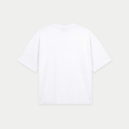 White oversized t-shirt back view with bold “Super Fresa” graphic in pink and black with stars and Caracas Merch branding