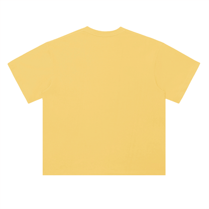 Yellow oversized t-shirt back view with wooden spinning top graphic forming “ccs” in rope-style lettering – Caracas Merch