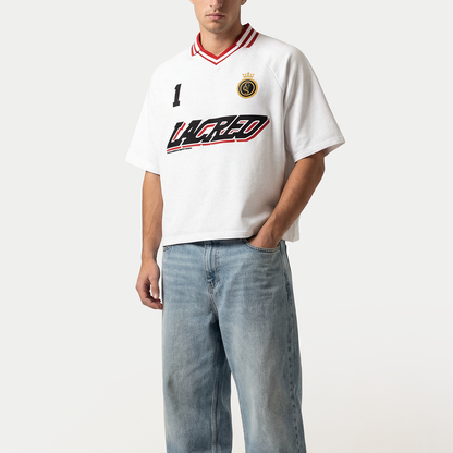 Model wearing un lacreo white men’s jersey by Caracas Merch