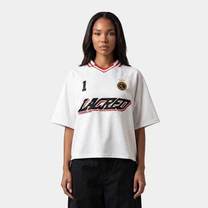 Model styled in Un Lacreo white women’s streetwear jersey